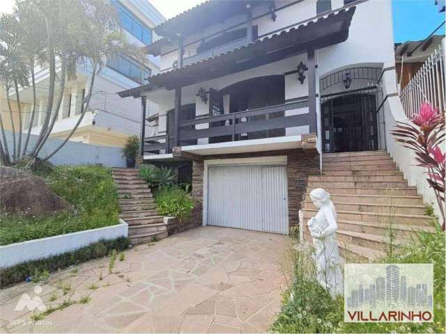 Casa com 5 dormitórios para alugar, 382 m² por R$ 7.000/mês - Tristeza - Porto Alegre/RS