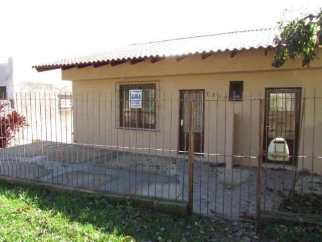 Cod.imóvel: 2211 - Casa no Bairro VILA NOVA com 45 m2, 2 dormitórios, Área de serviço, Banheiro social, Cozinha, Garagem, Pátio, Sacada, Tanque