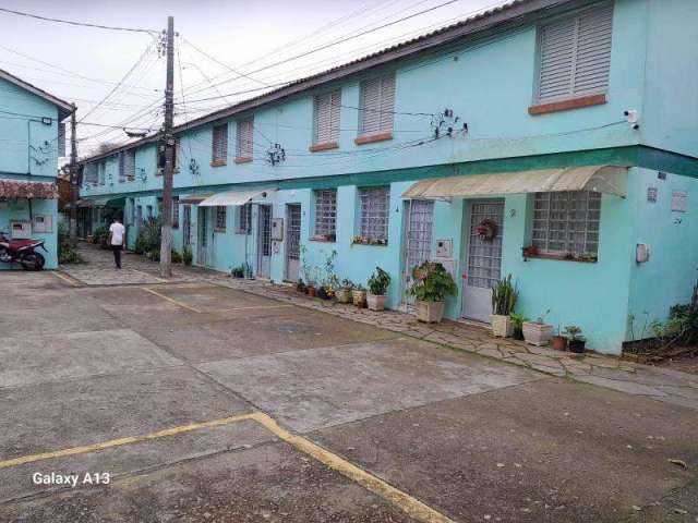 SOBRADO, com 2 dormitórios , sala, cozinha , área de serviços, banheiro e estacionamento rotativo