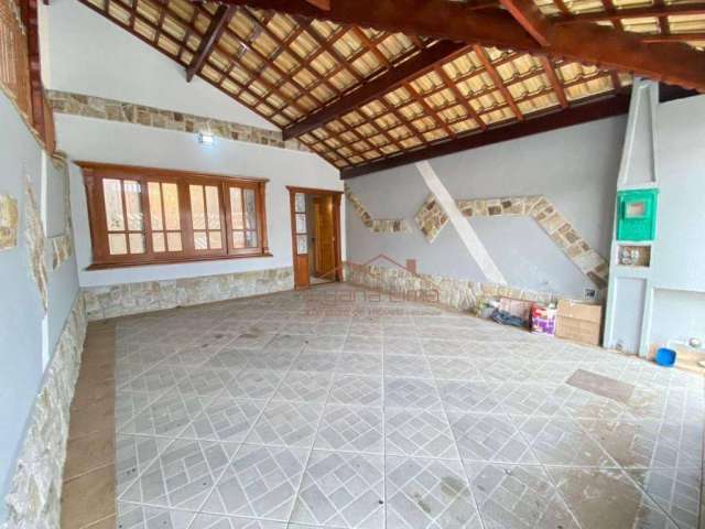 Casa com 3 dormitórios à venda, 123 m² por R$ 540.000,00 - Maracanã - Praia Grande/SP