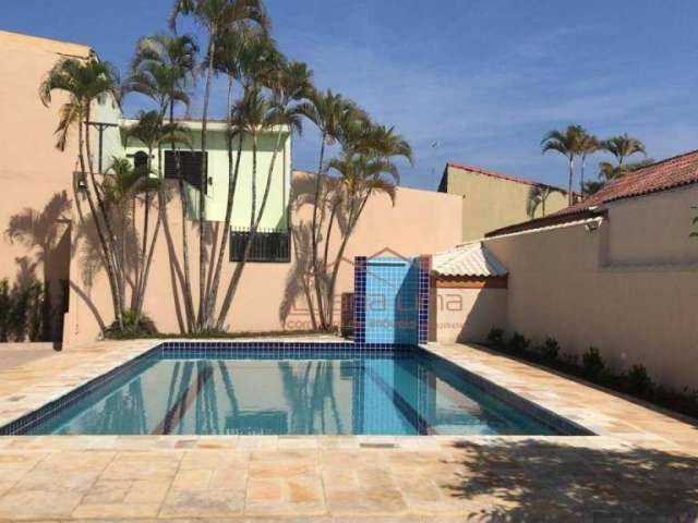 Casa com 4 dormitórios à venda por R$ 1.060.000,00 - Solemar - Praia Grande/SP