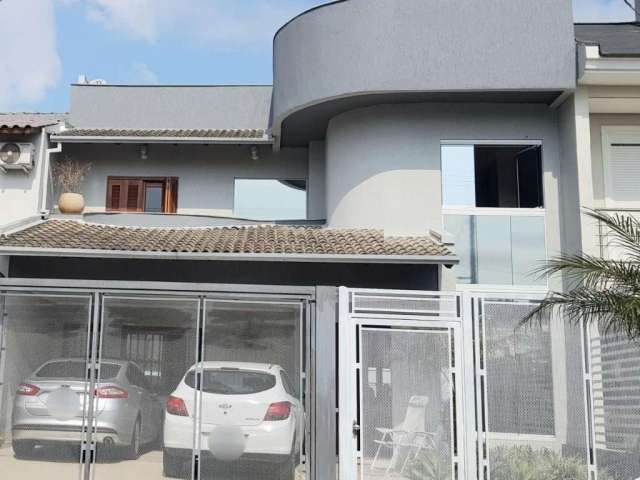 Casa em condomínio fechado com 4 quartos à venda na Ângelo Raphael Frizzo, 95, Alto Petrópolis, Porto Alegre, 216 m2 por R$ 940.000