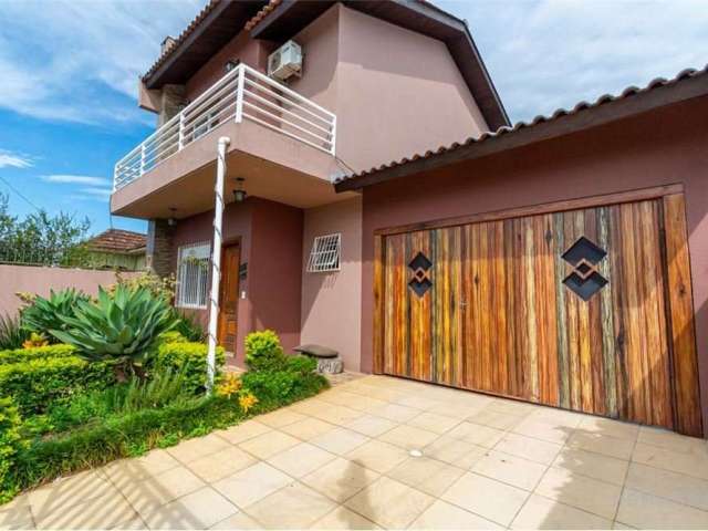 Casa com 2 quartos à venda na Rua Alexandre de Gusmão, 303, Estância Velha, Canoas, 148 m2 por R$ 990.000