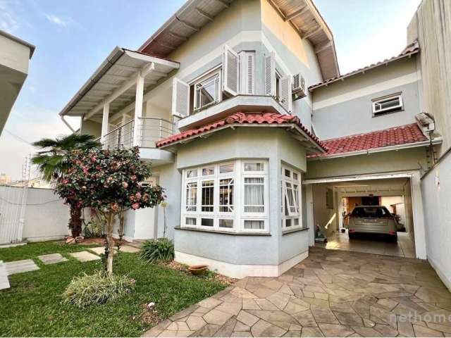 Casa com 5 quartos à venda na Suíça, 170, Moinhos De Vento, Canoas, 243 m2 por R$ 1.249.000