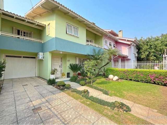 Casa com 4 quartos à venda na Rua Adão Pinheiro da Silva, 85, Ipanema, Porto Alegre, 267 m2 por R$ 900.000