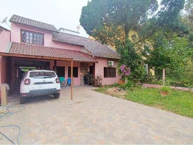 Casa em condomínio fechado com 3 quartos à venda na Tapir Rocha, 6614, São Lucas, Viamão, 157 m2 por R$ 585.000