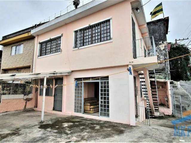 Sobrado com 2 casas e  salão comercial.