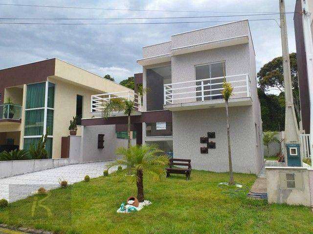 Casa com 3 dormitórios à venda, 150 m² por R$ 990.000,00 - Bougainvillee IV - Peruíbe/SP