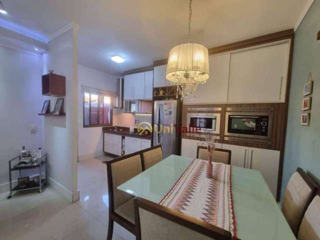 Casa com 3 dormitórios à venda, 90 m² com quintal por R$ 469.000