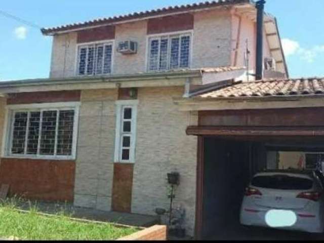 Casa com 3 quartos à venda na Rua Tupi, 468, Vila Monte Carlo, Cachoeirinha por R$ 370.000