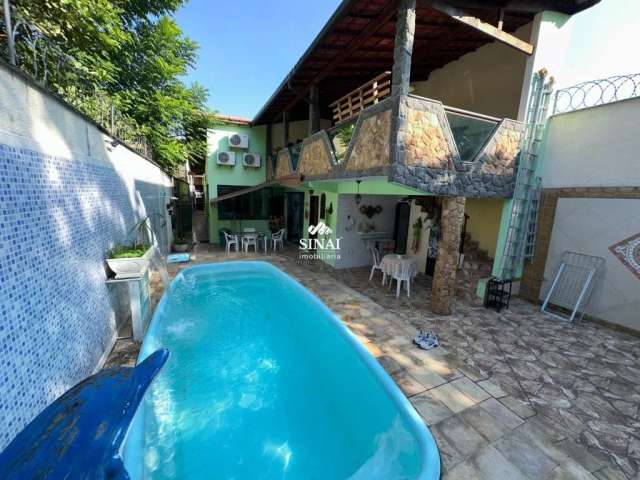 Casa com 4 quartos à venda na Rua Carajás, 9999999999, Vila Kosmos, Rio de Janeiro por R$ 850.000