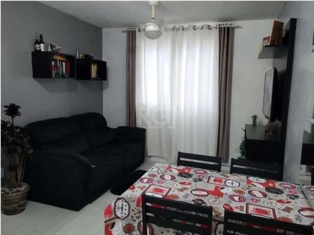 Apartamento com 2 dormitórios localizado no 3º andar no bairro Mato Grande em Canoas. Possui sala de estar/jantar, cozinha, banheiro e área de serviço. Ficam os móveis sob medida no quarto principal, 