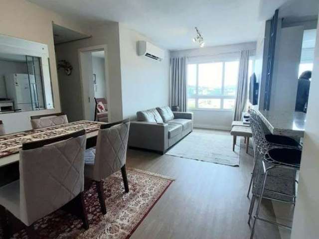 Belo apartamento com 2 dormitórios, suíte, área de serviço, cozinha americana com churrasqueira, uma vaga de garagem escriturada. Edifício com salão de festas, piscina e portaria virtual. Esta muito b