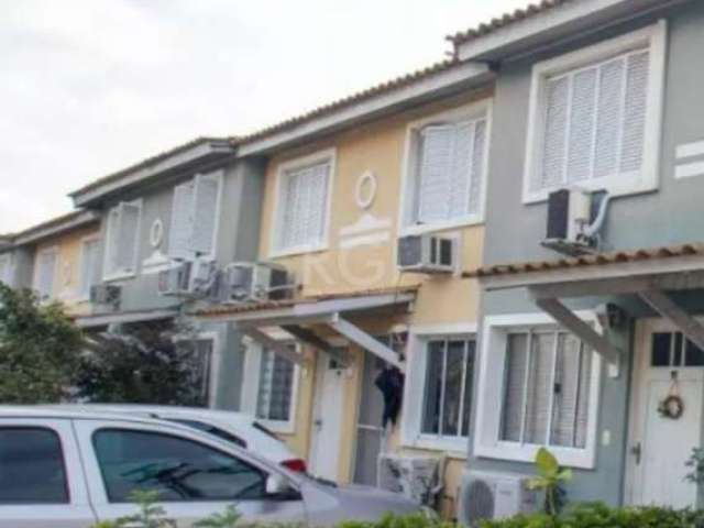 Excelente casa com 3 dormitórios, banheiro social, living para 2 ambientes com lavabo, cozinha com móveis planejados, pátio com churrasqueira, 1 vaga de garagem em condomínio fechado no bairro Sarandi