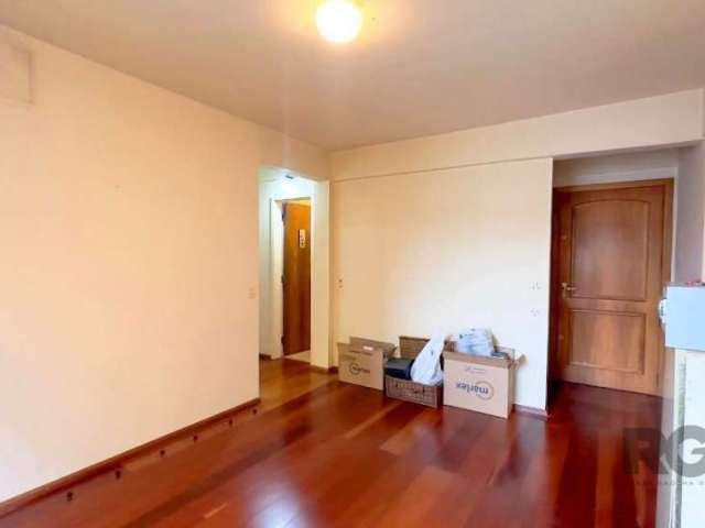 Vende apartamento bem iluminado com grande circulação de ar, 2 dormitórios, banheiro, hall de entrada, sala de estar/living, cozinha, área de serviço,  1 vaga de garagem, sendo que no imóvel ficam os 