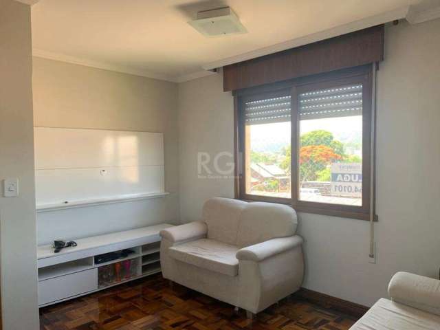 Vende apartamento de 02 dormitórios de frente, banheiro social, cozinha americana.