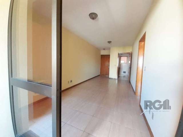 Apartamento de 2 dormitórios, sendo 1 suíte, no bairro Santana, em Porto Alegre. Sacada com churrasqueira, living amplo para 2 ambientes, banheiro social, cozinha conjugada com área de serviço e vaga 