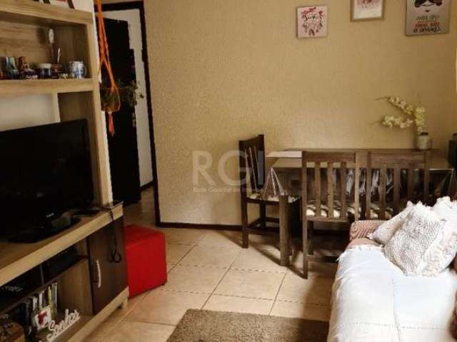 Apartamento Térreo de 2 dormitórios no bairro Rio Branco em Porto Alegre: Apartamento com 2 dormitórios, living, cozinha, área de serviço, banheiro com ventilação direta. vaga de estacionamento rotati