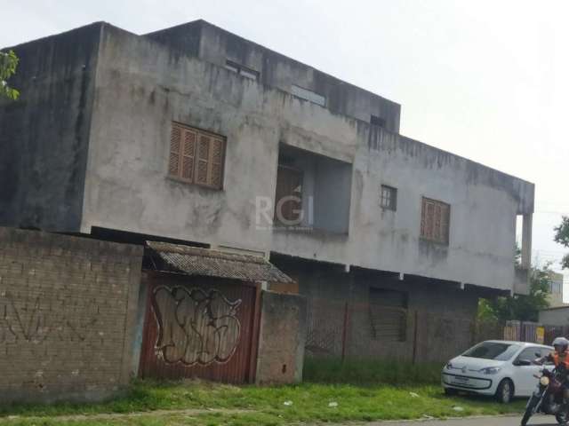 Sobrado em Construção: Primeiro piso 1 banheiro, 2 salas que poderá usar como residencial ou comercial com entrada independente. Segundo piso com 3 dormitórios com suíte, closet e sacada, sala de esta