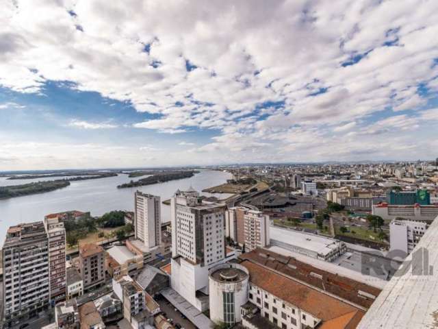 Vende sala em andar alto com linda vista para o Guaíba, divisórias, semi mobiliada, 2 banheiros.&lt;BR&gt;&lt;BR&gt;Condomínio oferece: Portaria 24 horas, elevadores e câmeras de vigilância.