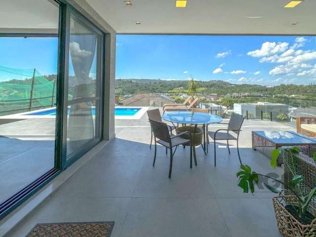 Morar no Alphaville é uma experiência incrível, especialmente quando se pode desfrutar de uma vista deslumbrante como a oferecida por esta casa espetacular! &lt;BR&gt;&lt;BR&gt;Com um living amplo em 