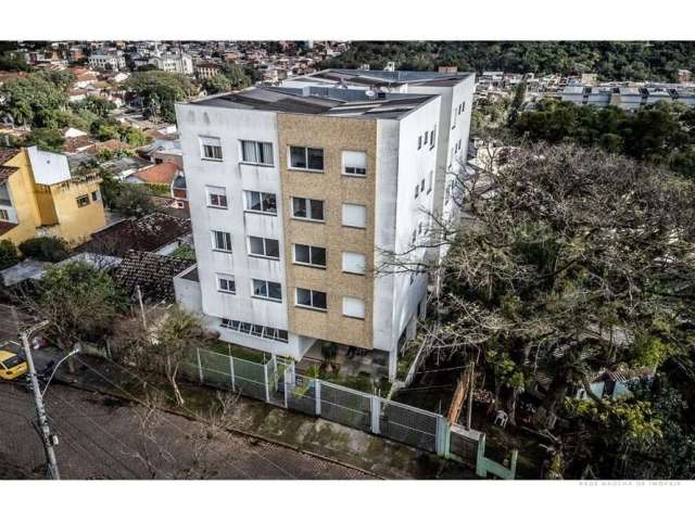 Encante-se com este magnífico apartamento disponível para venda no bairro de Teresópolis. Com 61m², 2 acolhedores dormitórios - incluindo uma suíte - e um banheiro social, este imóvel banhado pelo sol