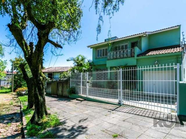 Encantadora Casa de 4 Quartos à Venda em Chácara das Pedras, Porto Alegre. Descubra esta linda propriedade residencial, no charmoso bairro Chácara das Pedras, Porto Alegre. Esta casa exclusiva, com 30