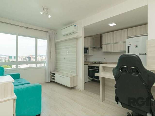 Descubra o conforto e a modernidade neste apartamento completamente mobiliado e equipado disponível para venda no bairro Menino Deus. Localizado na Rua Coronel André Belo, em um edifício novo e contem