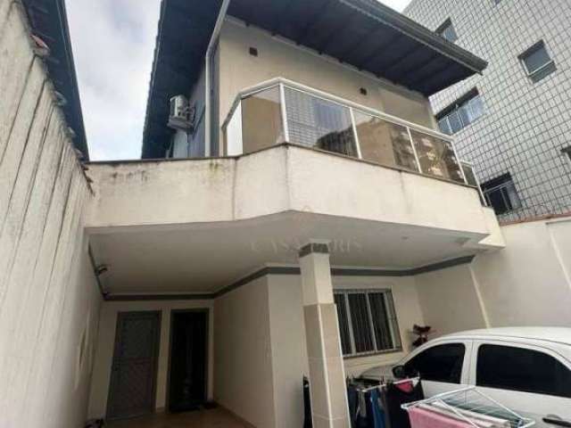 Sobrado com 3 dormitórios à venda, 129 m² por R$ 650.000,00 - Caiçara - Praia Grande/SP