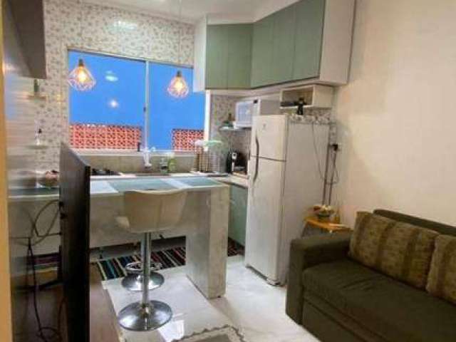 Apartamento com 2 dormitórios e 1 suíte à venda, 42 m² por R$ 290.000 - Mirim - Praia Grande/SP