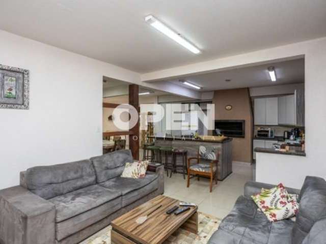 Casa com 3 quartos à venda na Rua Osvaldo Optiz, 482, Estância Velha, Canoas por R$ 645.000