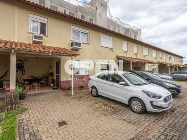 Casa em condomínio fechado com 3 quartos à venda na Rua República, 2708, Harmonia, Canoas por R$ 430.000
