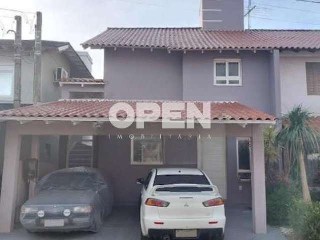 Casa em condomínio fechado com 3 quartos à venda na Rua República, 2050, Harmonia, Canoas por R$ 850.000