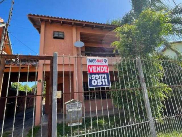 Casa com 4 quartos à venda na Rua Francisca Lechner, 143, Parque Santa Fé, Porto Alegre por R$ 585.000