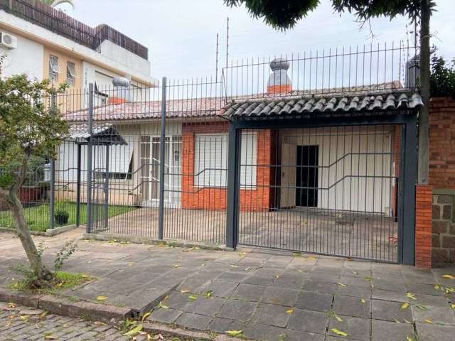 Casa com 3 quartos à venda na Avenida La Paz, 115, Jardim Lindóia, Porto Alegre por R$ 859.000