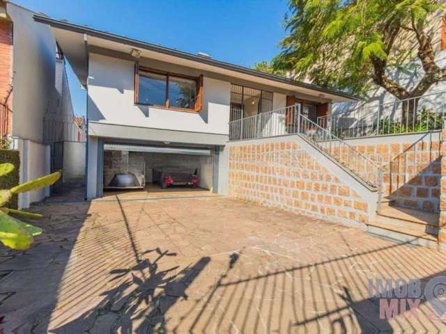 Casa com 5 quartos à venda na Rua Hipólito da Costa, 386, Santa Tereza, Porto Alegre por R$ 1.350.000