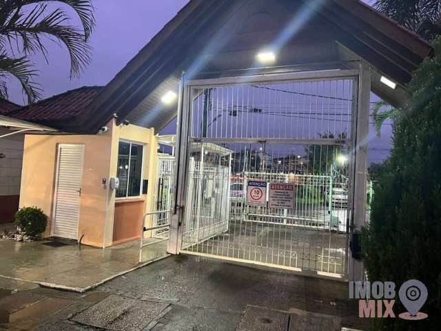 Casa em condomínio fechado com 3 quartos à venda na Avenida João Ferreira Jardim, 968, Parque Santa Fé, Porto Alegre por R$ 290.000