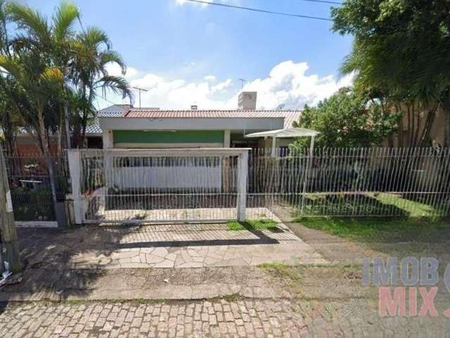 Casa com 3 quartos à venda na Travessa Alasca, 98, Jardim Lindóia, Porto Alegre por R$ 949.900