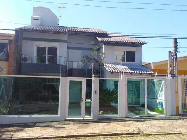 Casa com 3 quartos à venda na Travessa Java, 115, Jardim Lindóia, Porto Alegre por R$ 1.500.000