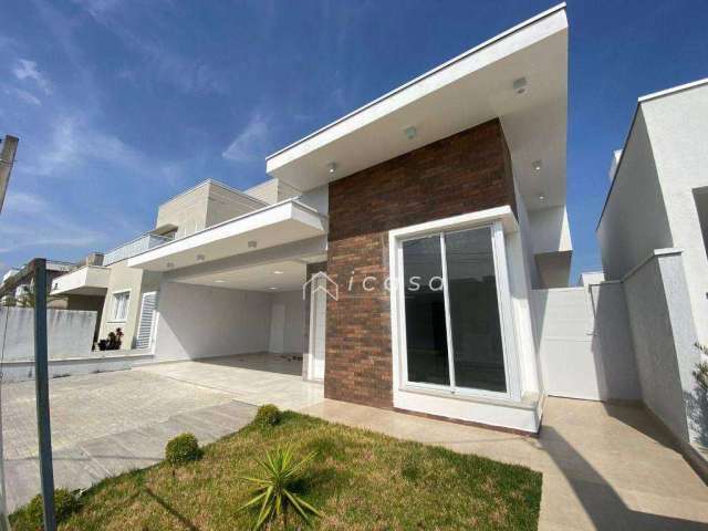 Casa com 3 dormitórios à venda, 177 m² por R$ 1.050.000,00 - Condomínio Ouro Ville - Taubaté/SP