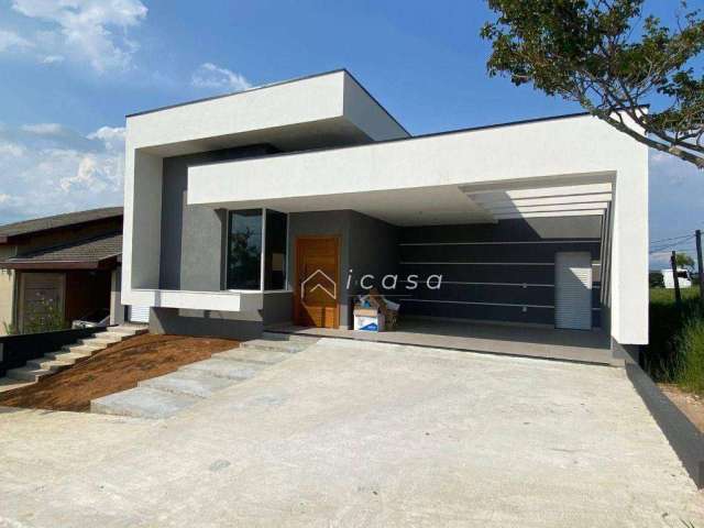 Casa com 3 dormitórios à venda, 160 m² por R$ 1.100.000,00 - Condomínio Terras do Vale - Caçapava/SP