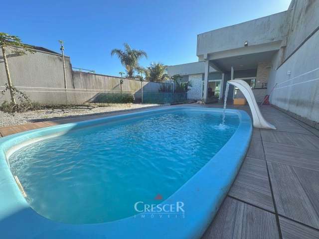 Casa com piscina a venda no Balneário Inajá