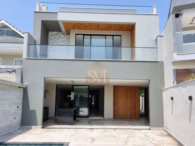 Recreio-Casa contemporânea triplex à venda 5 quartos sendo 4 suítes 498m², 3 vagas, piscina-Condomínio Riviera del Sol