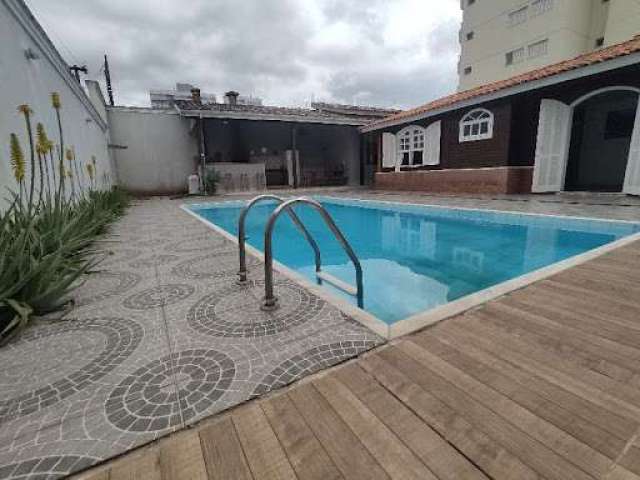 Casa com 4 dormitórios, 236 m² - venda por R$ 1.010.000,00 ou aluguel por R$ 4.840,00 - Indaiá - Caraguatatuba/SP