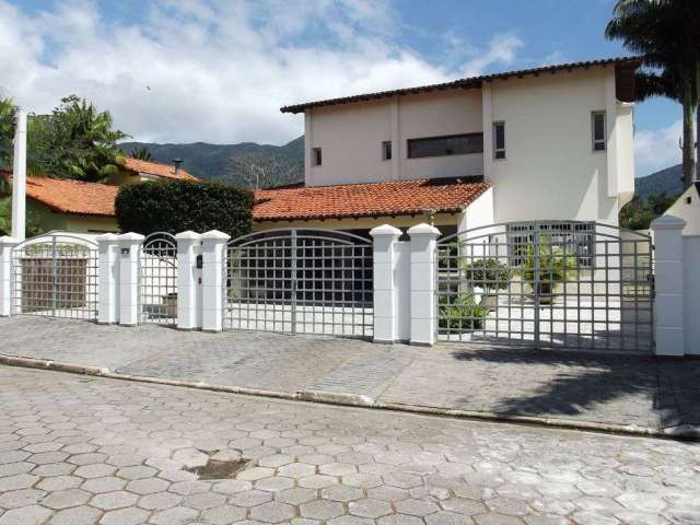 Casa com 3 dormitórios, 420 m² - venda por R$ 1.950.000,00 ou aluguel por R$ 8.700,00/mês - Arrastão - São Sebastião/SP