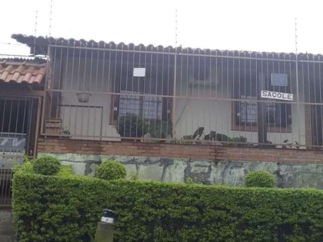 Casa com 3 quartos à venda na Rua Abram Goldsztein, 59, Jardim Carvalho, Porto Alegre, 104 m2 por R$ 389.999