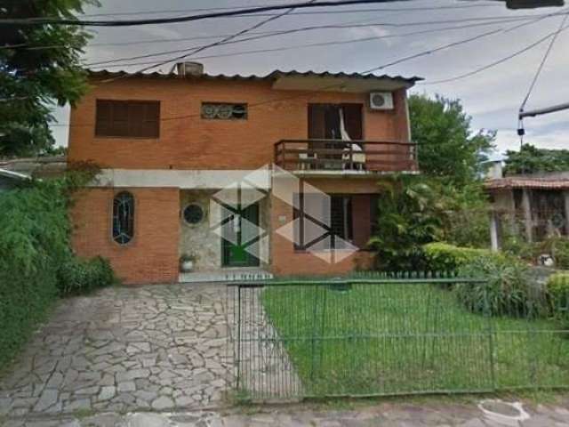 Casa com 3 quartos à venda na Rua Jacundá, 670, Guarujá, Porto Alegre, 245 m2 por R$ 530.000