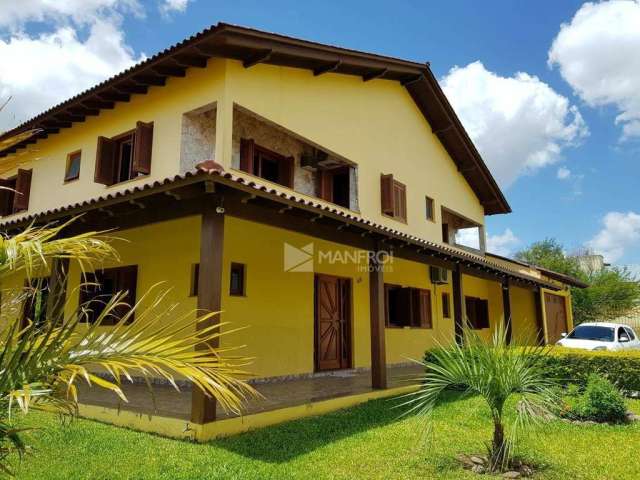 Casa com 5 dormitórios à venda, 509 m² por R$ 1.699.990,00 - Parque Santa Fé - Porto Alegre/RS