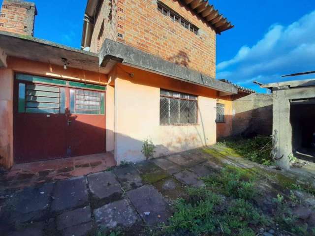 Casa com 3 dormitórios à venda, 134 m² por R$ 341.000,00 - Bela Vista - Alvorada/RS