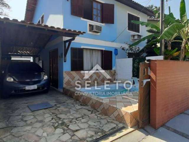 Casa com 2 dormitórios, 77 m², à venda por R$ 330.000